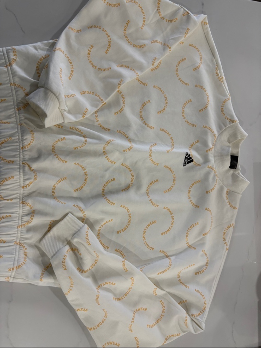 adidas Cream Sweatshirt with Gold Circular Logo Print